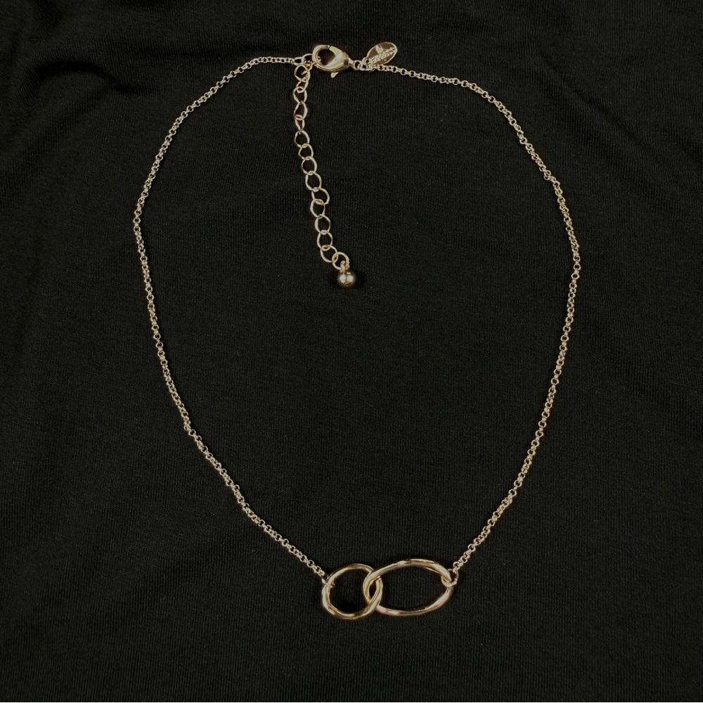 Express Gold tone Interlocking Loops necklace.